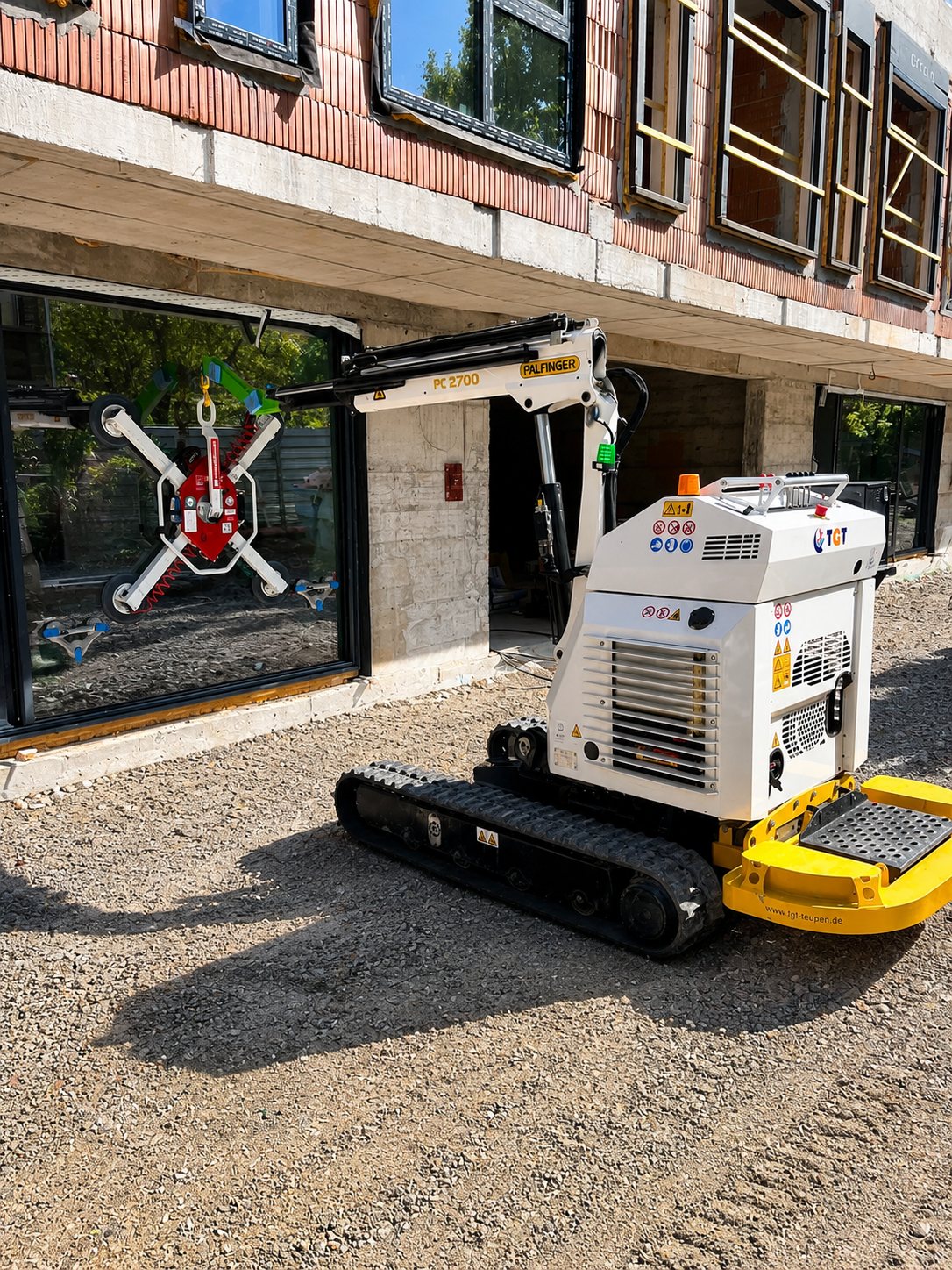Instalación de vidrio con mini grúa y ventosas profesionales
